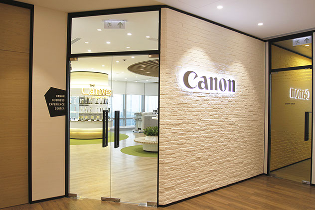 totalgroups environment hk canon logo signage showroom Interior Design